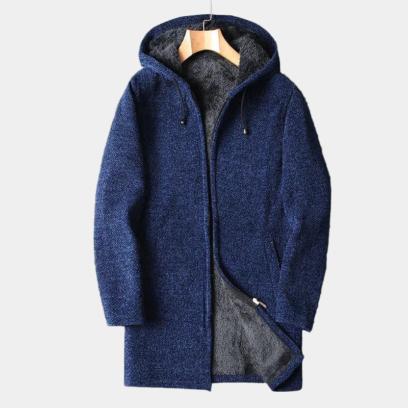 Blue hooded fleece coat on a hanger against a light background