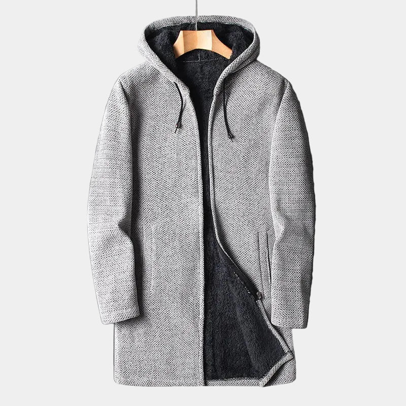 Gray hooded coat on a hanger against a light background