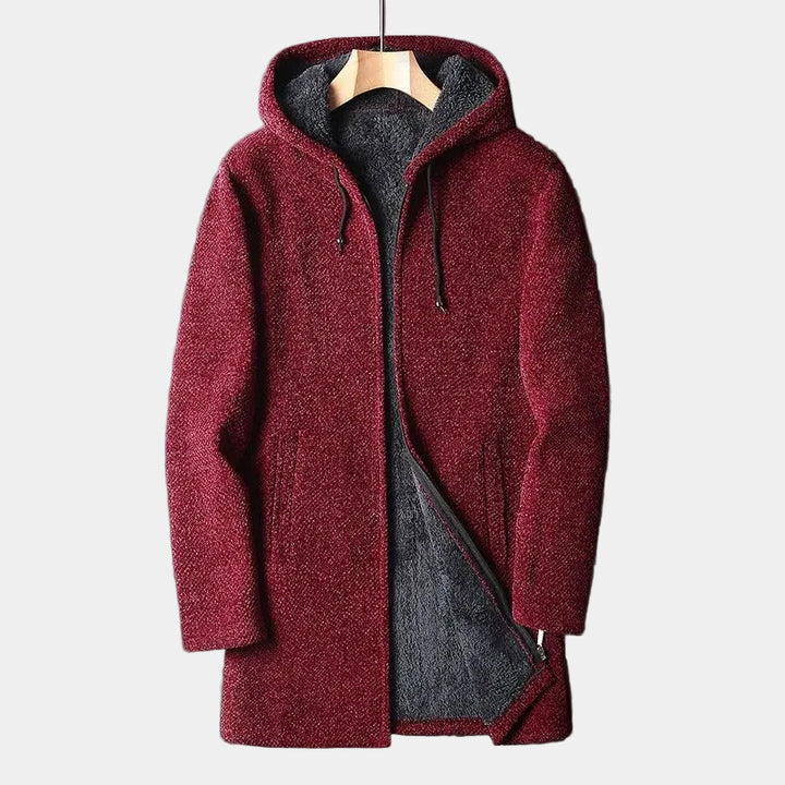 Red hooded fleece coat on a light background