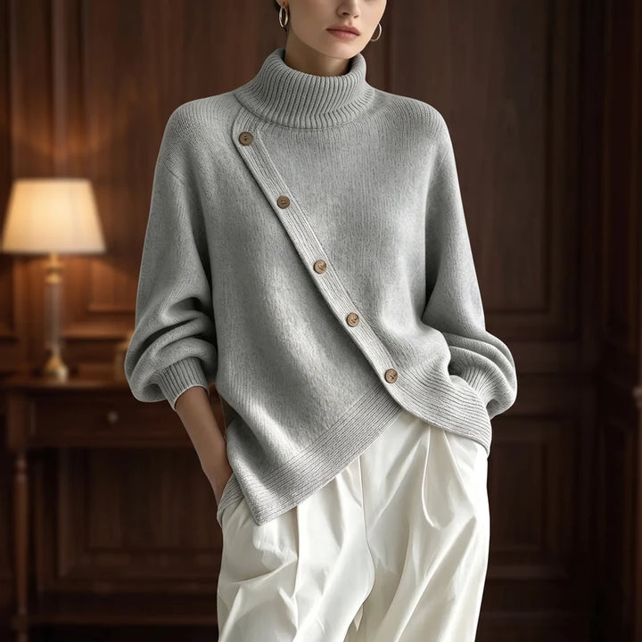 Gray knitted sweater in a dark wood interior