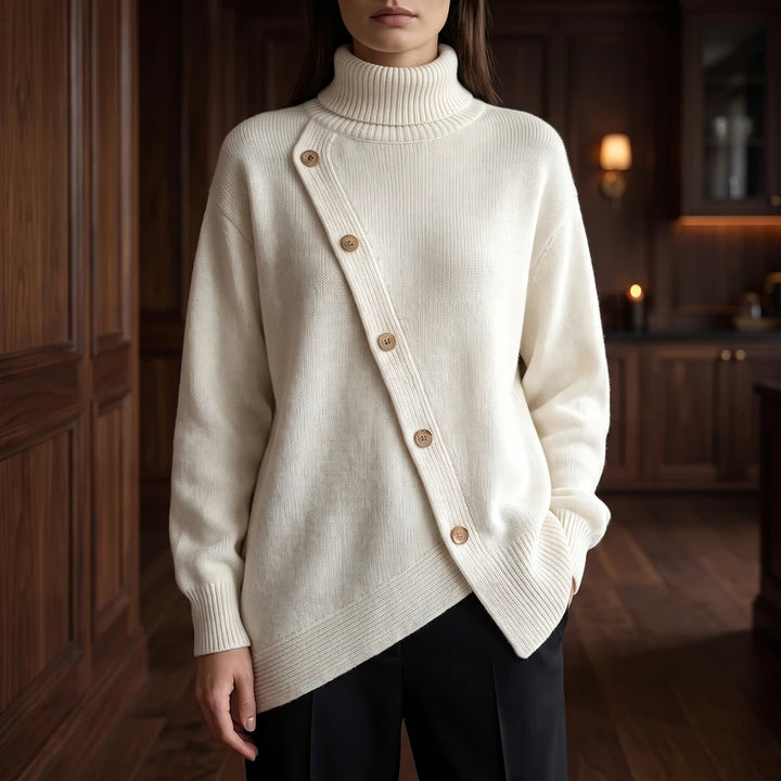 White knitted sweater in a dark wood interior
