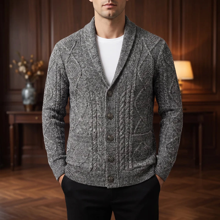 Gray knitted cardigan in a dark wood interior