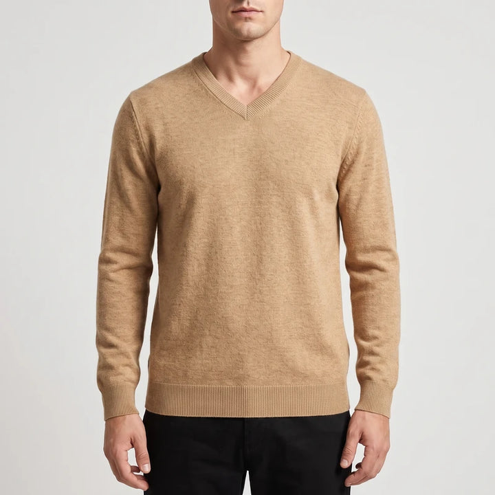Camel knitted sweaters on an off-gray studio background
