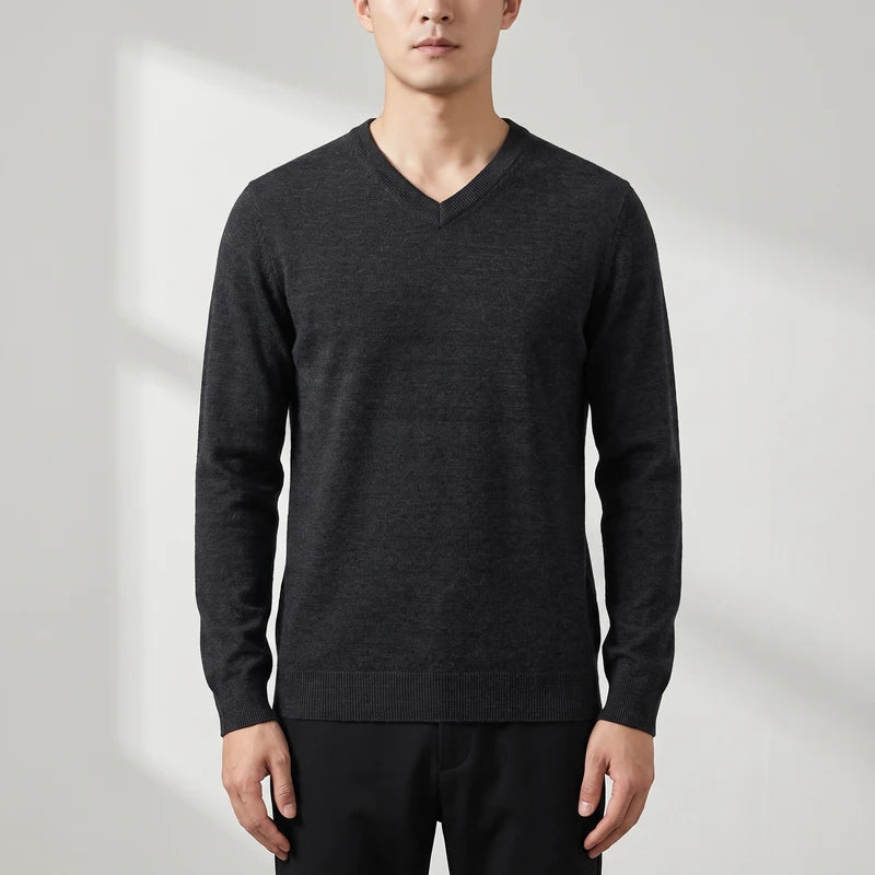 Dark Grey knitted sweaters on an off-gray studio background