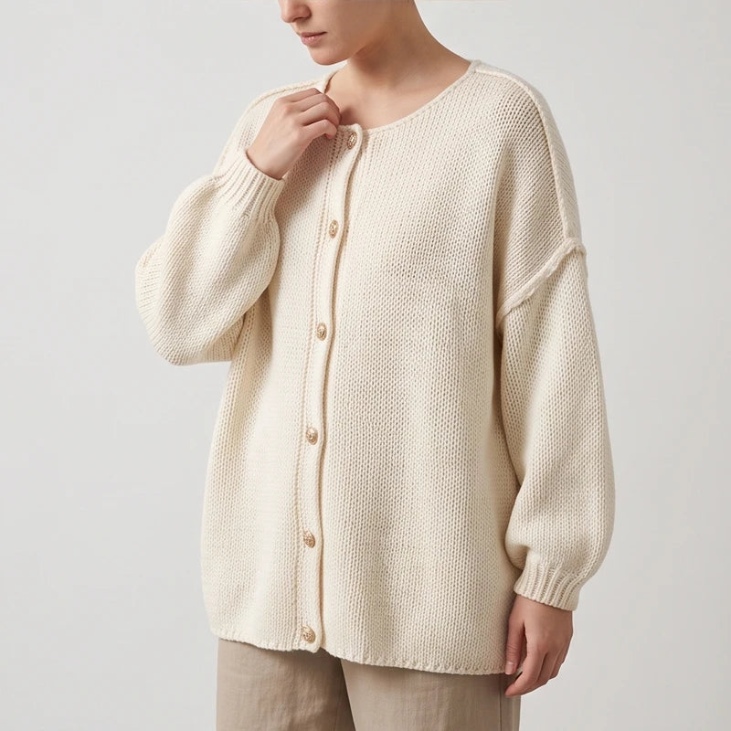 Beige knit cardigan on an off-gray studio background - 2