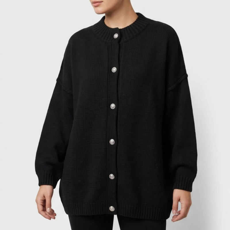 Black knit cardigan on an off-gray studio background - 2