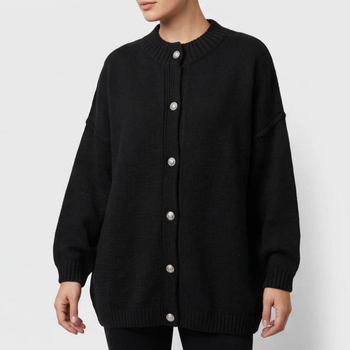 Black knit cardigan on an off-gray studio background - 2
