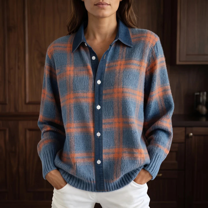 Blue cardigan in a dark wood interior