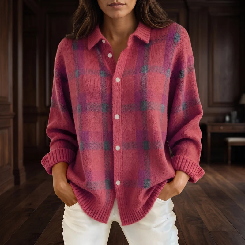 Pink cardigan in a dark wood interior