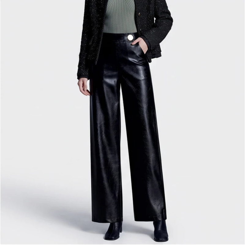 Black leather pants on an off-gray studio background - 2