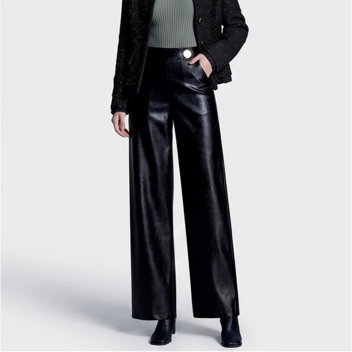 Black leather pants on an off-gray studio background - 2