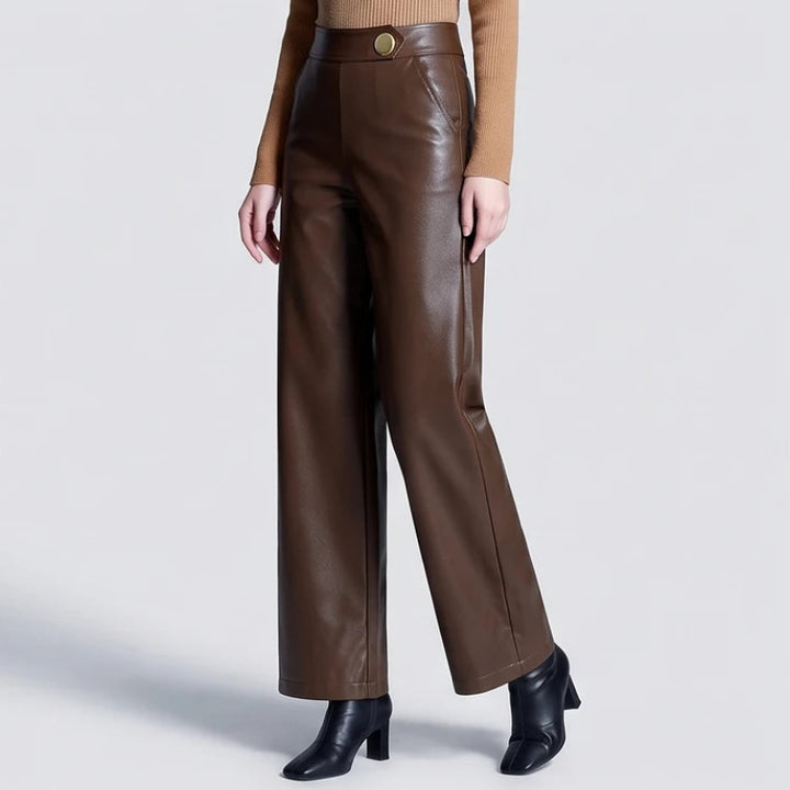 Coffee leather pants on an off-gray studio background - 2