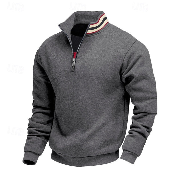 Charcoal gray quarter-zip sweatshirt with a striped collar in white, red, and black, featuring a visible silver zipper.