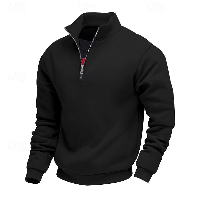 Black quarter-zip sweatshirt with a high collar and a silver zipper, showing a hint of red fabric behind it.