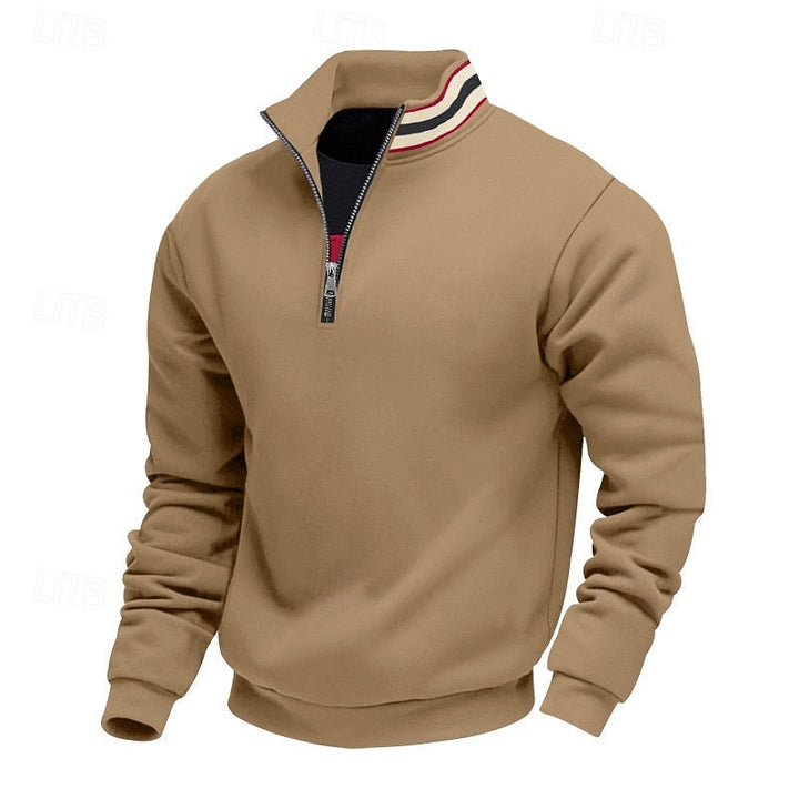 Tan quarter-zip sweatshirt with a striped stand collar in red, white, and black, on a white background.