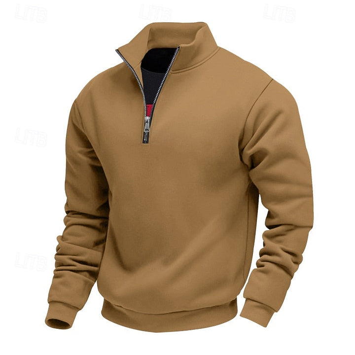 Tan quarter-zip sweatshirt with a standing collar and ribbed cuffs, displayed on a white background.
