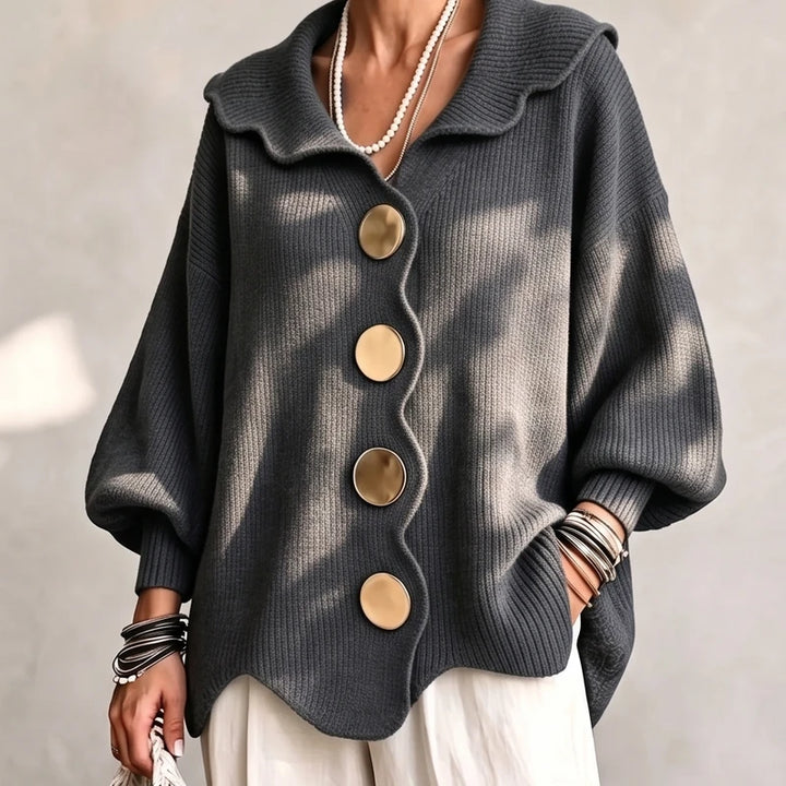 Dark Grey knit cardigan on an off-gray studio background