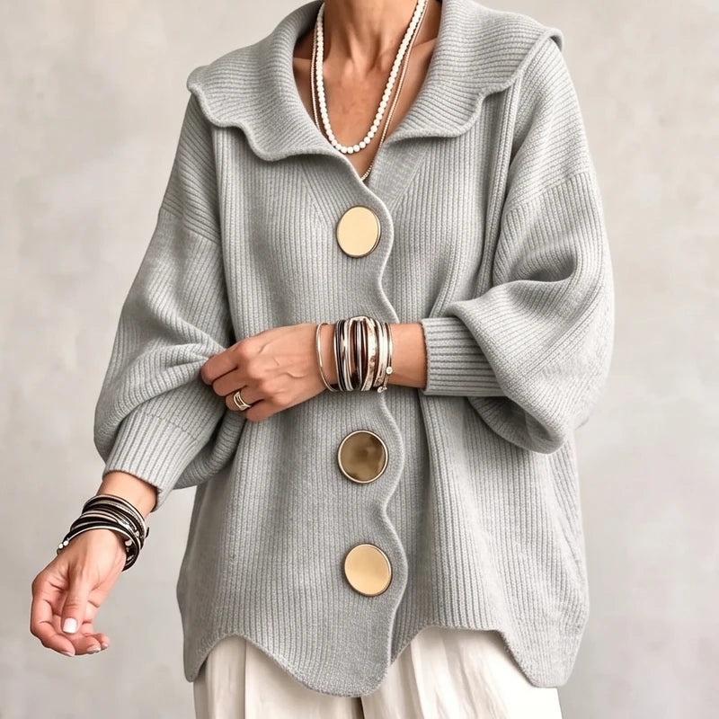 Light Grey knit cardigan on an off-gray studio background