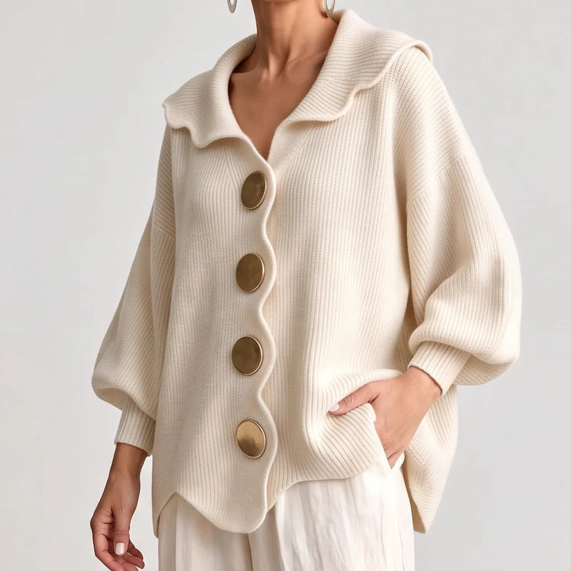WHITE knit cardigan on an off-gray studio background
