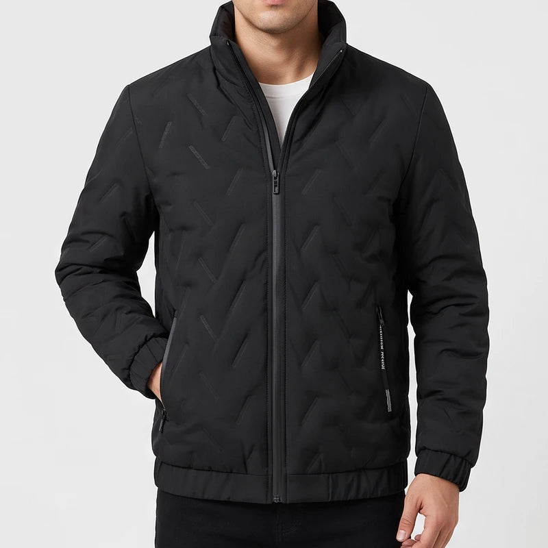Black jacket on an off-gray studio background