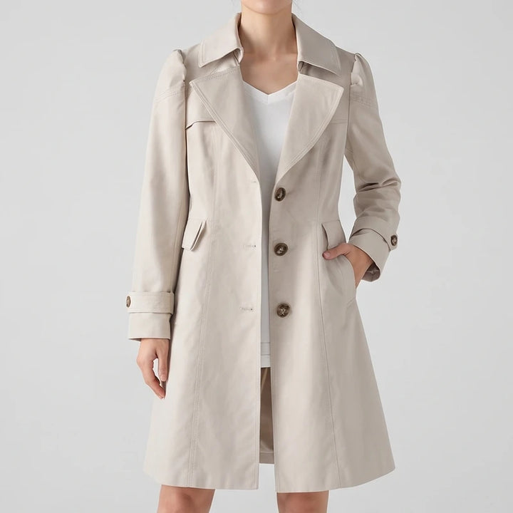 Beige top on an off-gray studio background