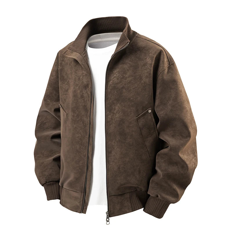 Brown jacket with a textured finish, ribbed collar and cuffs, zippered front, and a single chest pocket.