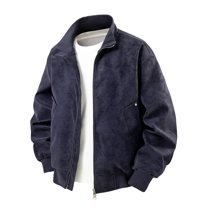 Navy blue suede-textured jacket with ribbed collar, cuffs, and hem, zipped over a white t-shirt.