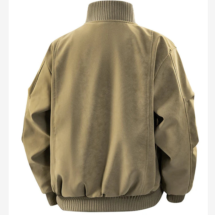 Back view of a tan jacket with a ribbed stand-up collar, cuffs, and hem, showcasing a relaxed fit.