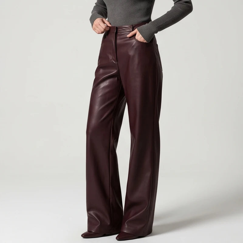 Brown leather pants on an off-gray studio background - 2