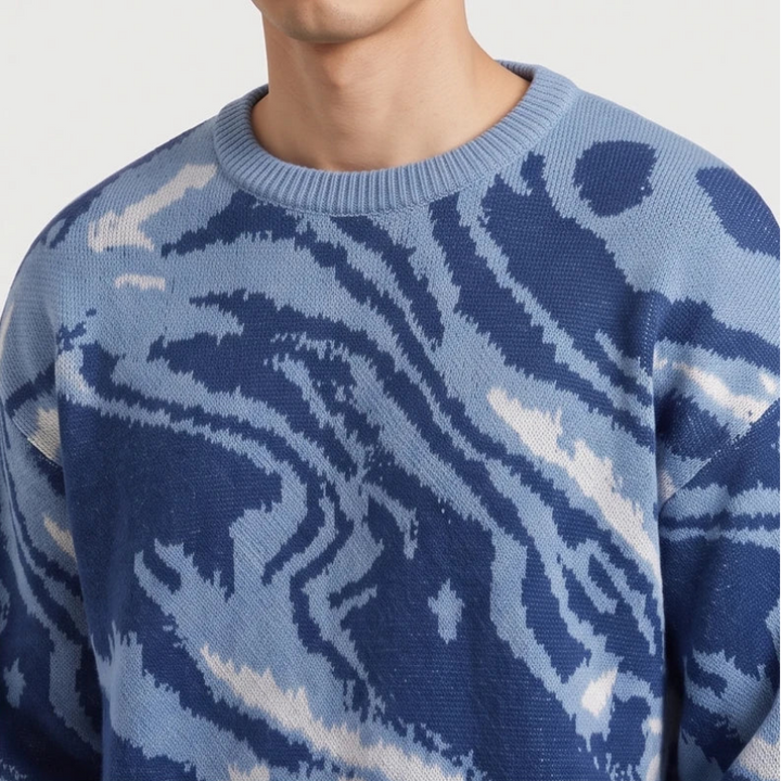 Blue knit pullover on an off-gray studio background - 2