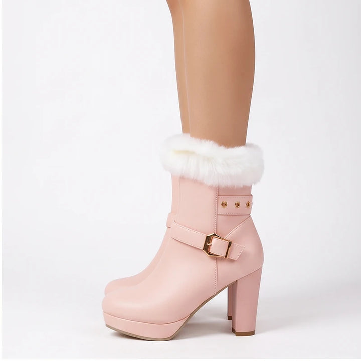 Model wearing Pink boots in a studio