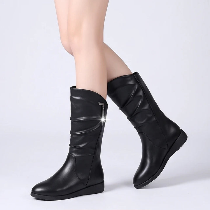 Model wearing Black boots outdoors