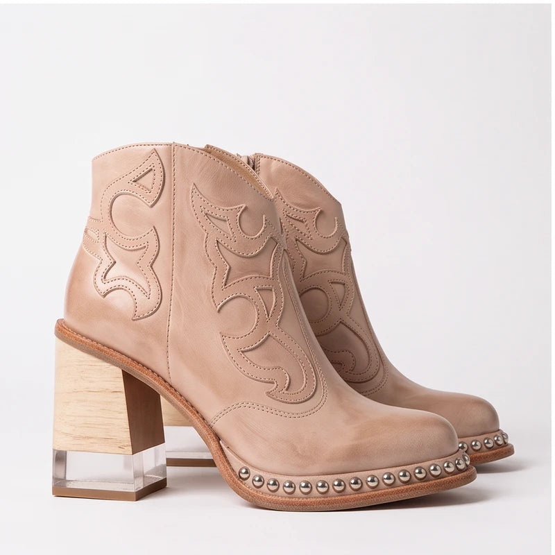 Model wearing Beige leather boots in a studio - 3