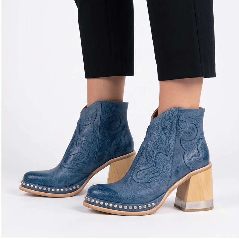 Model wearing Blue leather boots in a studio - 2