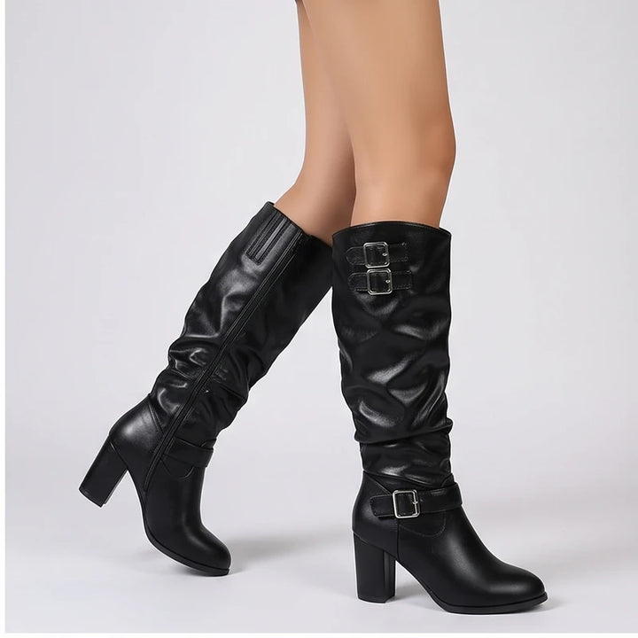 Model wearing Black metal heel in a studio - 2