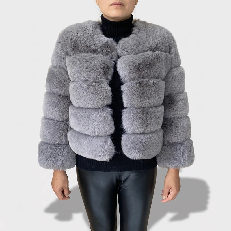 gray jacket on an off-gray studio background