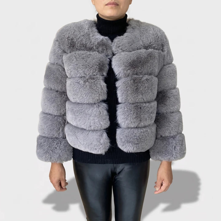 gray jacket on an off-gray studio background
