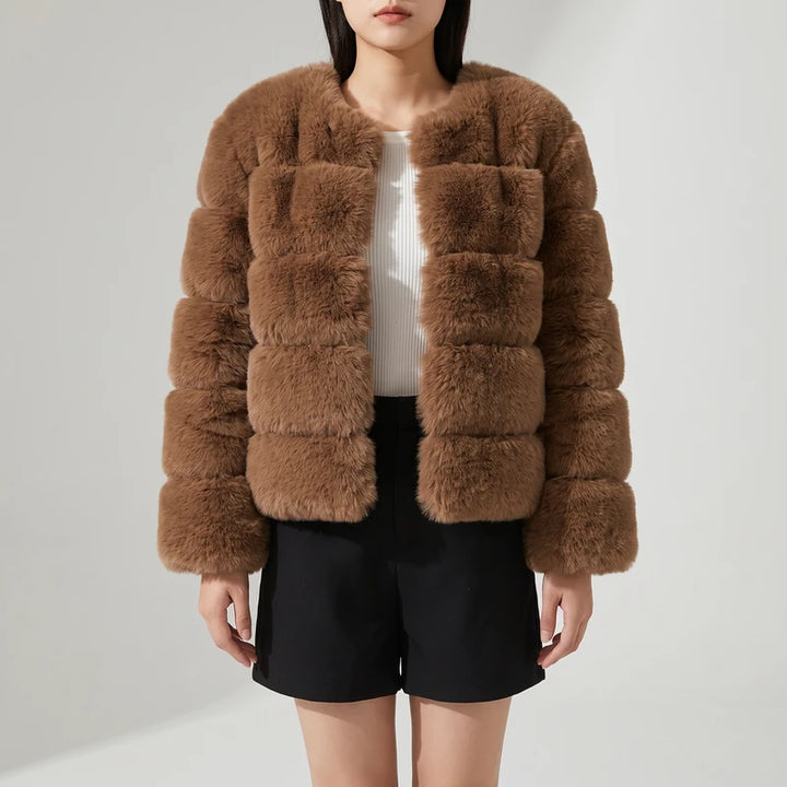 Khaki jacket on an off-gray studio background