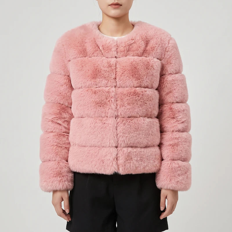 Pink jacket on an off-gray studio background