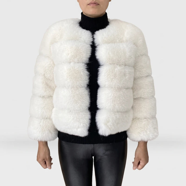 white jacket on an off-gray studio background