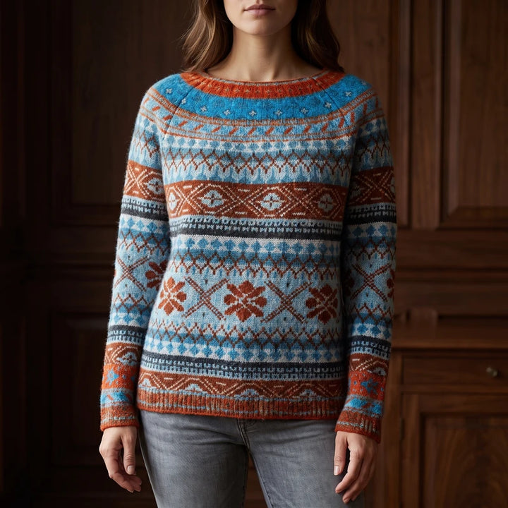 amethyst orchid sweater in a dark wood interior
