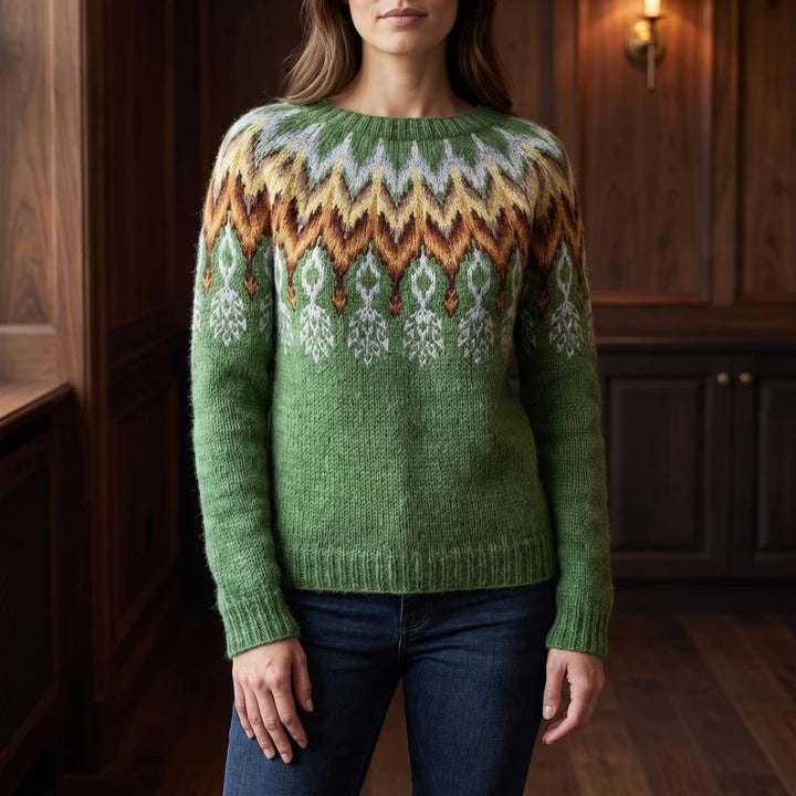 feather sweater in a dark wood interior