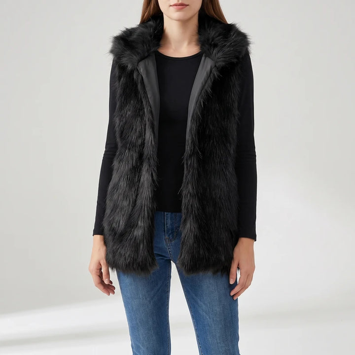 Black vest on an off-gray studio background