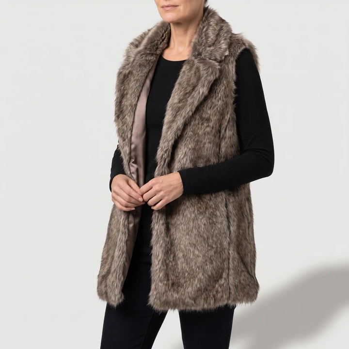 Coffee vest on an off-gray studio background