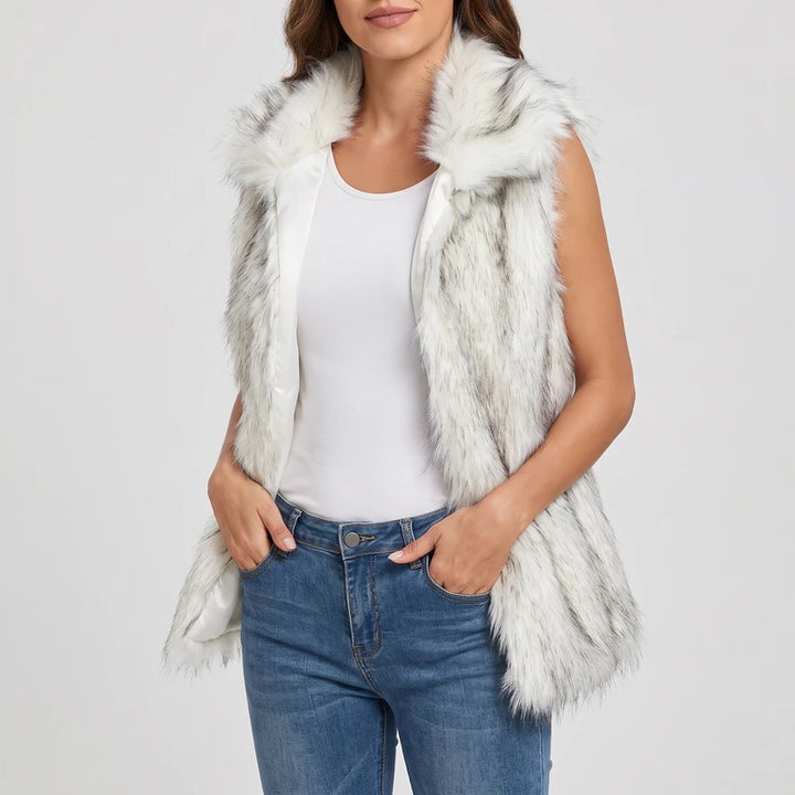 White vest on an off-gray studio background