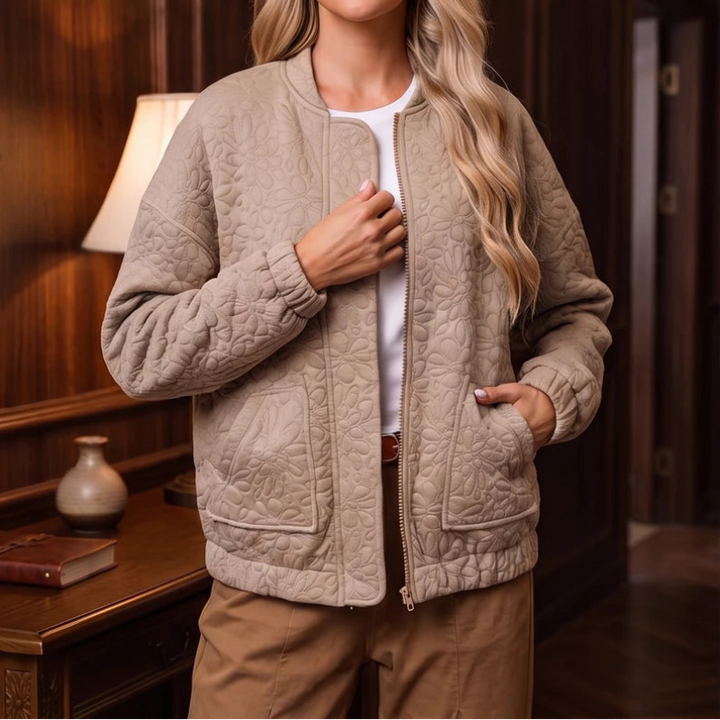 Khaki jacket in a dark wood interior