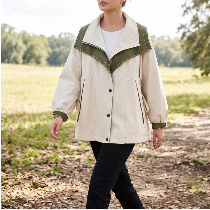 Model wearing Apricot jacket outdoors
