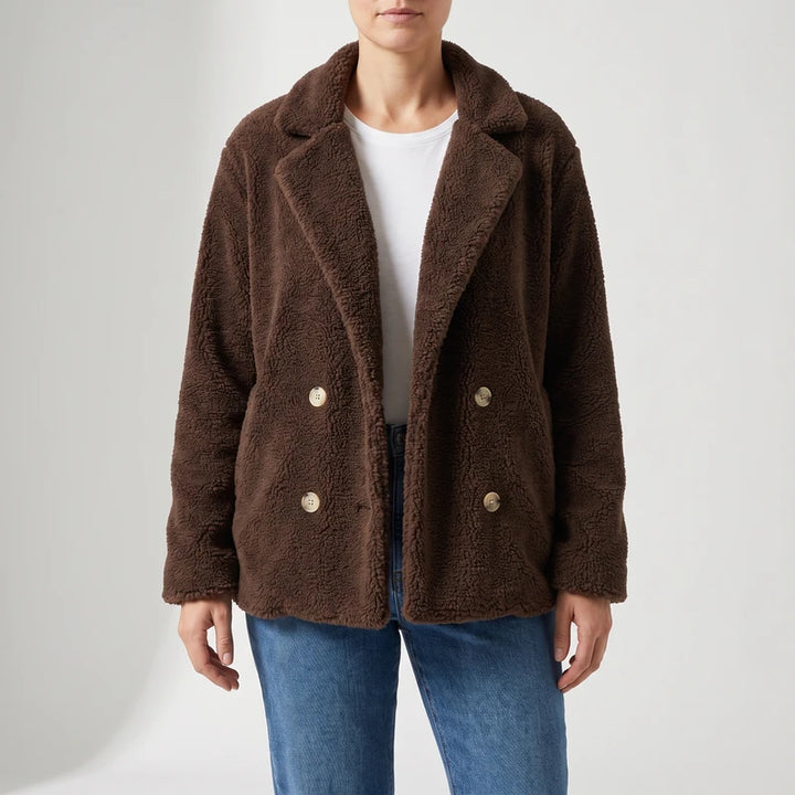 Brown wool blazer on an off-gray studio background