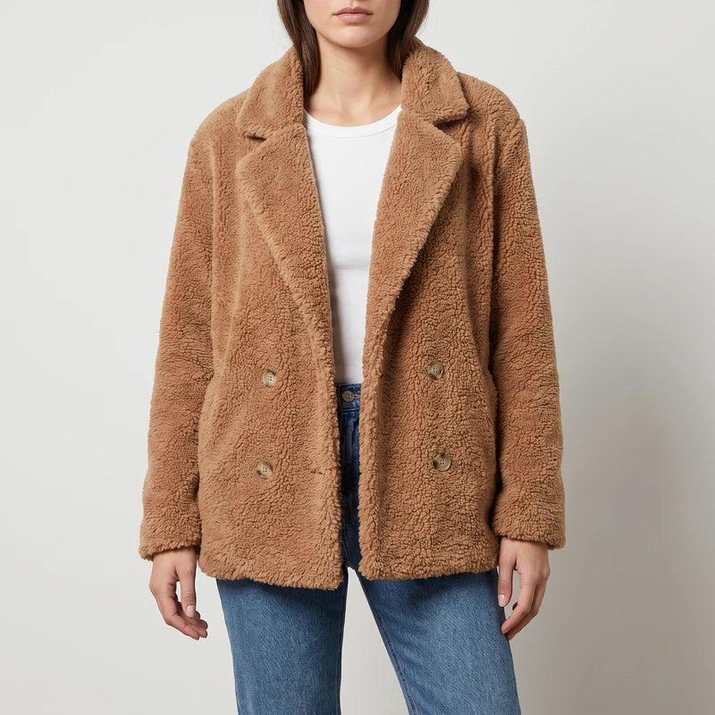 Camel wool blazer on an off-gray studio background