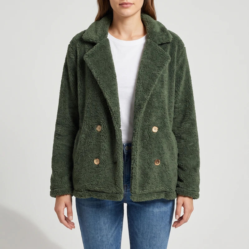 Green wool blazer on an off-gray studio background